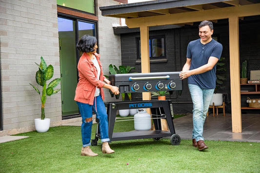 Pit Boss Ultimate 4-burner gas griddle with non-stick lift-off flat top surface for outdoor cooking