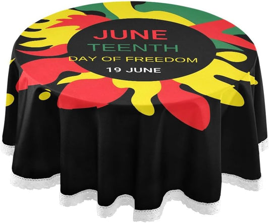 60-inch round black lace Juneteenth tablecloth on a party table setup