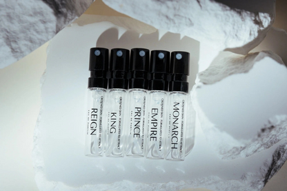 Crowned Skin Cologne Discovery Set displayed elegantly, featuring multiple premium men's fragrances in a curated gift set for men who appreciate luxury grooming.