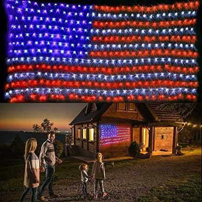 420 LED solar powered American flag string lights displayed on a yard fence for 4th of July decoration