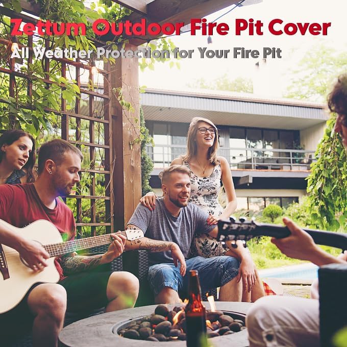 Black round 44-inch heavy duty waterproof fire pit cover with buckle straps on an outdoor fire pit on a patio