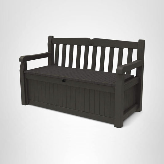 Keter Solana 70 gallon outdoor storage bench deck box in brown resin with wood texture finish on backyard patio storing cushions and pool accessories