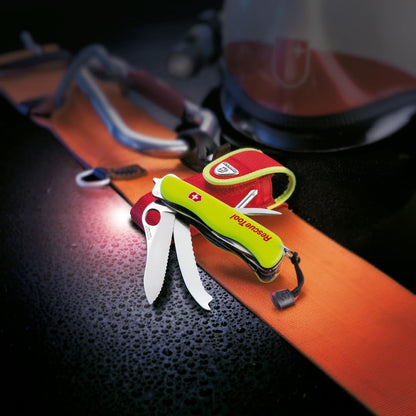 Victorinox Rescue Tool Swiss Army Knife in fluorescent yellow with 13 functions including seatbelt cutter and glass breaker, ideal for veterans and first responders.