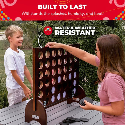 SWOOC Games premium giant four in a row game standing over 2 feet tall set up outdoors at a backyard party