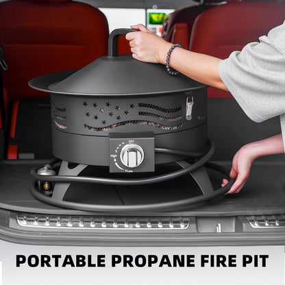  Black 20-inch round portable propane fire pit with grill grate and lava rocks glowing on a backyard patio at night