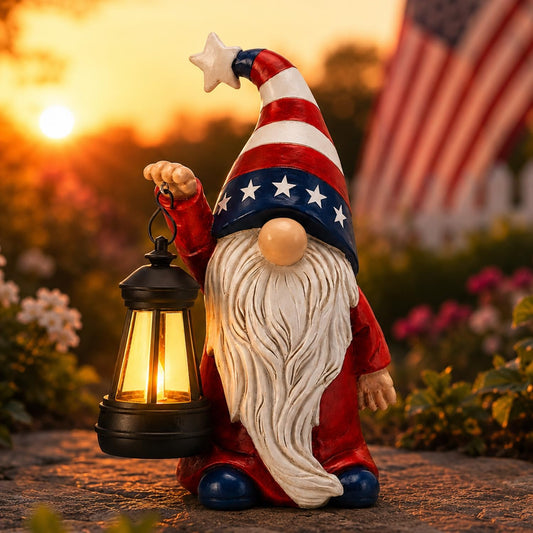 9.4 inch solar patriotic gnome lantern statue with American flag design glowing in a garden at dusk for 4th of July decoration
