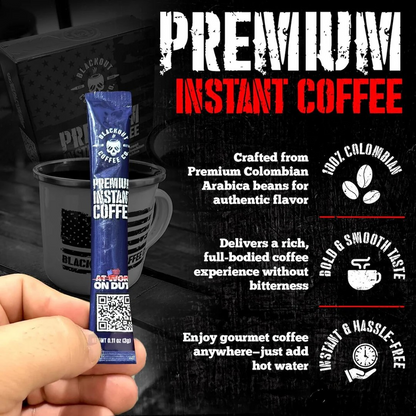 Blackout Coffee instant coffee single serve packs laid out on a rugged outdoor surface with an American flag in the background