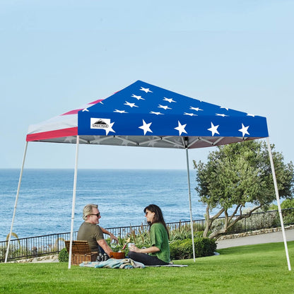 Eagle Peak 10x10 American Flag slant leg pop-up canopy tent set up outdoors with bold patriotic red white and blue design