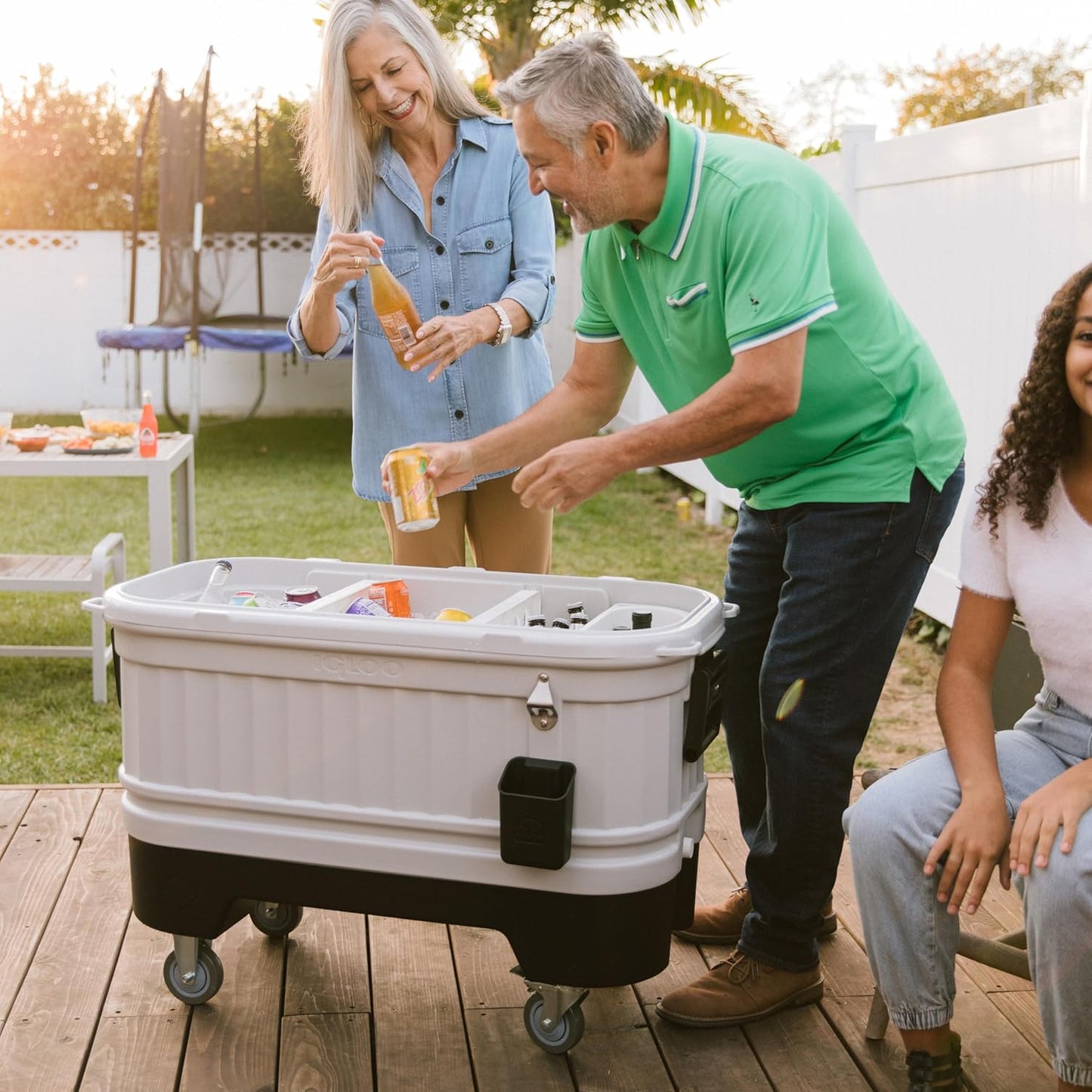 Igloo Party Bar 125 quart rolling hard cooler in gray with removable beverage tub lid, wheeled base, and stainless steel bottle opener for outdoor entertaining