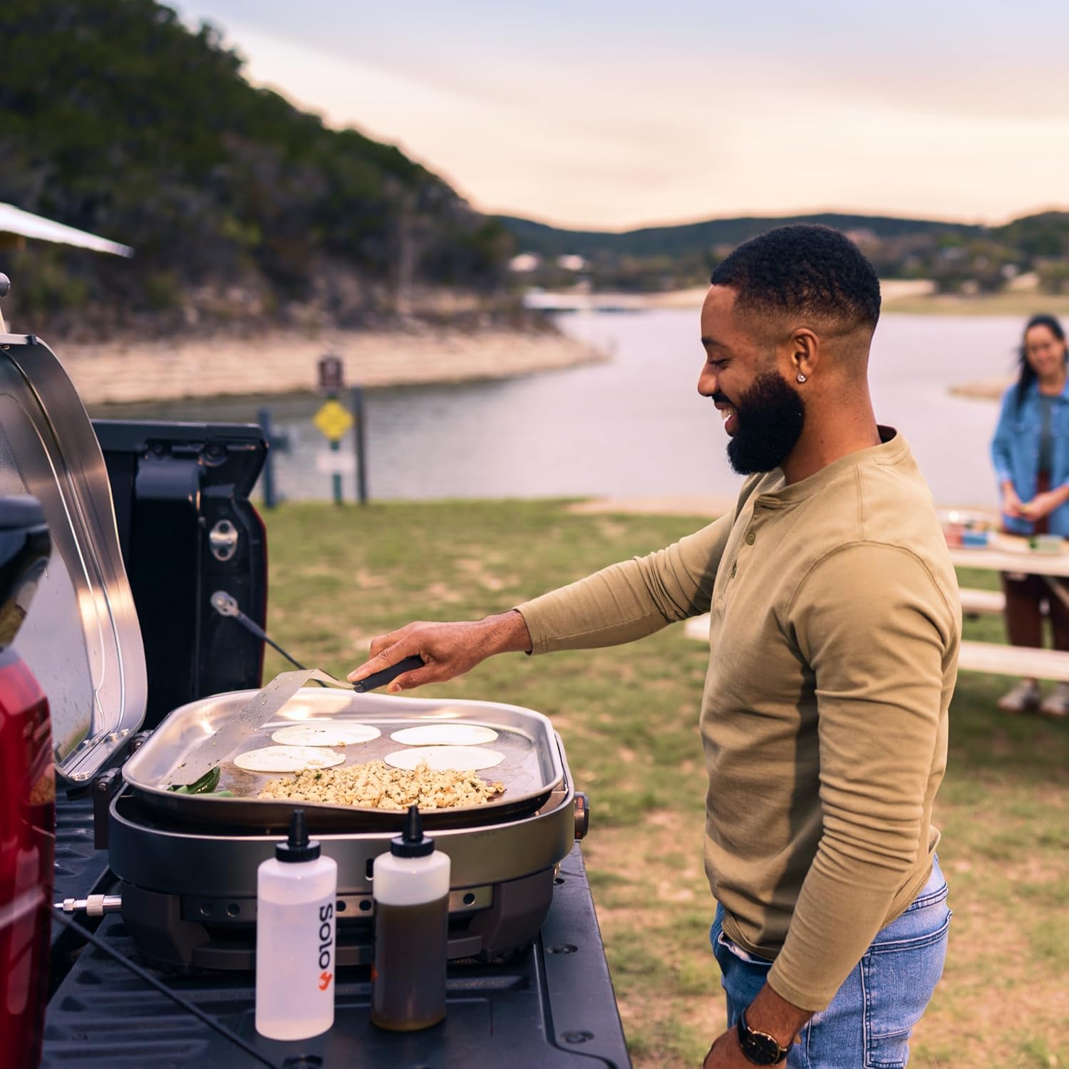 Solo Stove Steelfire 22 inch stainless steel propane griddle portable flat top outdoor grill on table