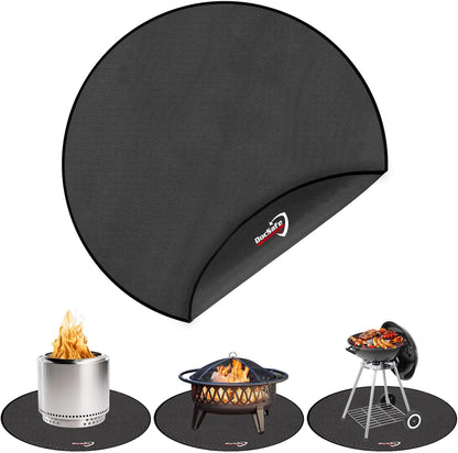 Black round 48-inch fireproof fire pit mat placed under an outdoor fire pit on a wooden deck
