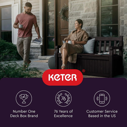 Keter Solana 70 gallon outdoor storage bench deck box in brown resin with wood texture finish on backyard patio storing cushions and pool accessories