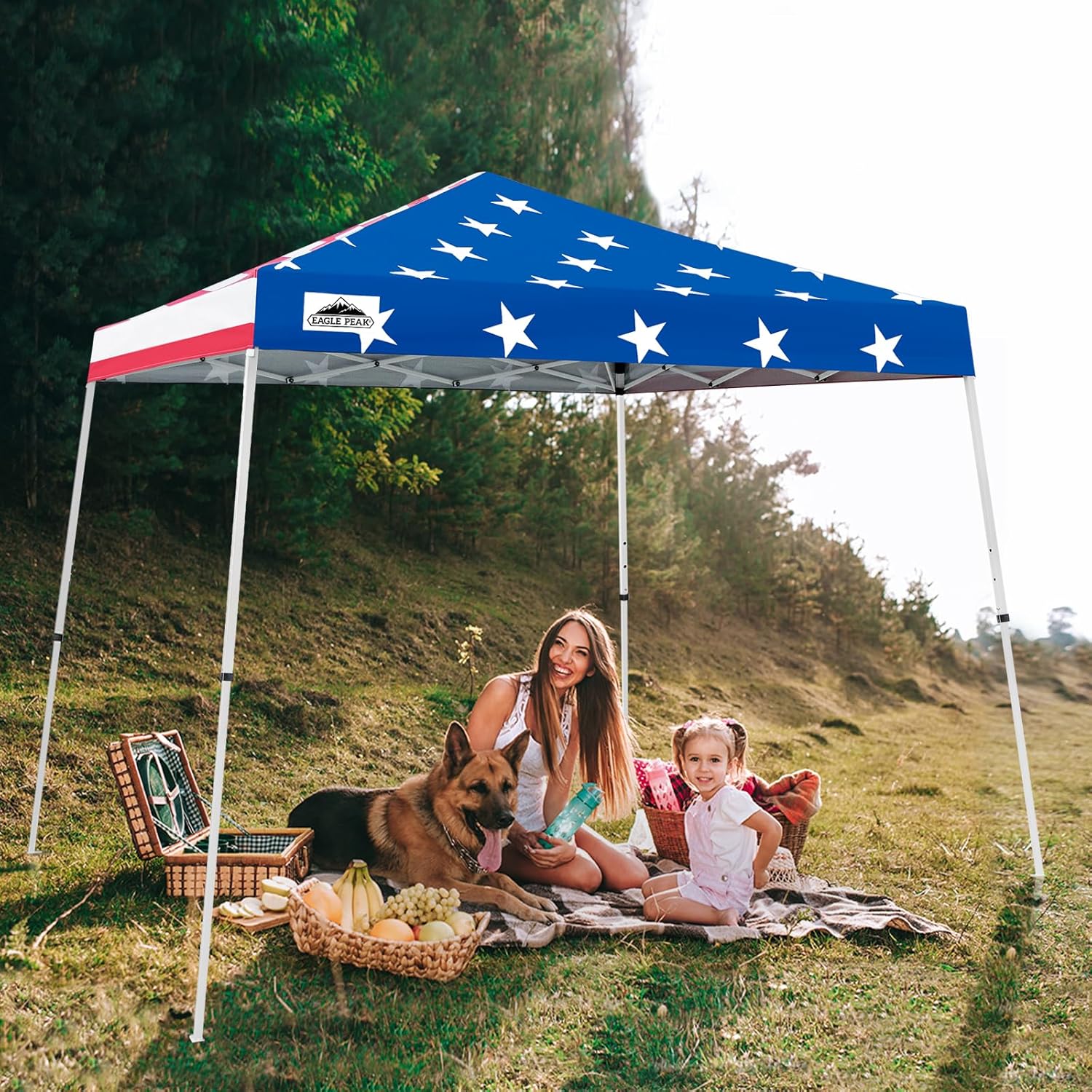 Eagle Peak 10x10 American Flag slant leg pop-up canopy tent set up outdoors with bold patriotic red white and blue design