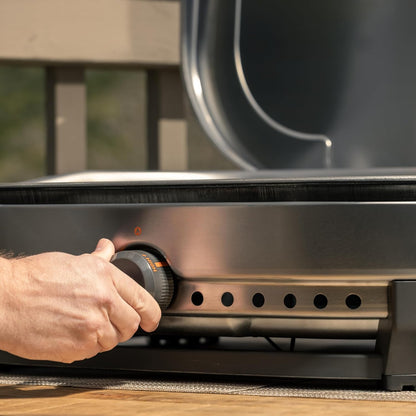 Solo Stove Steelfire 22 inch stainless steel propane griddle portable flat top outdoor grill on table