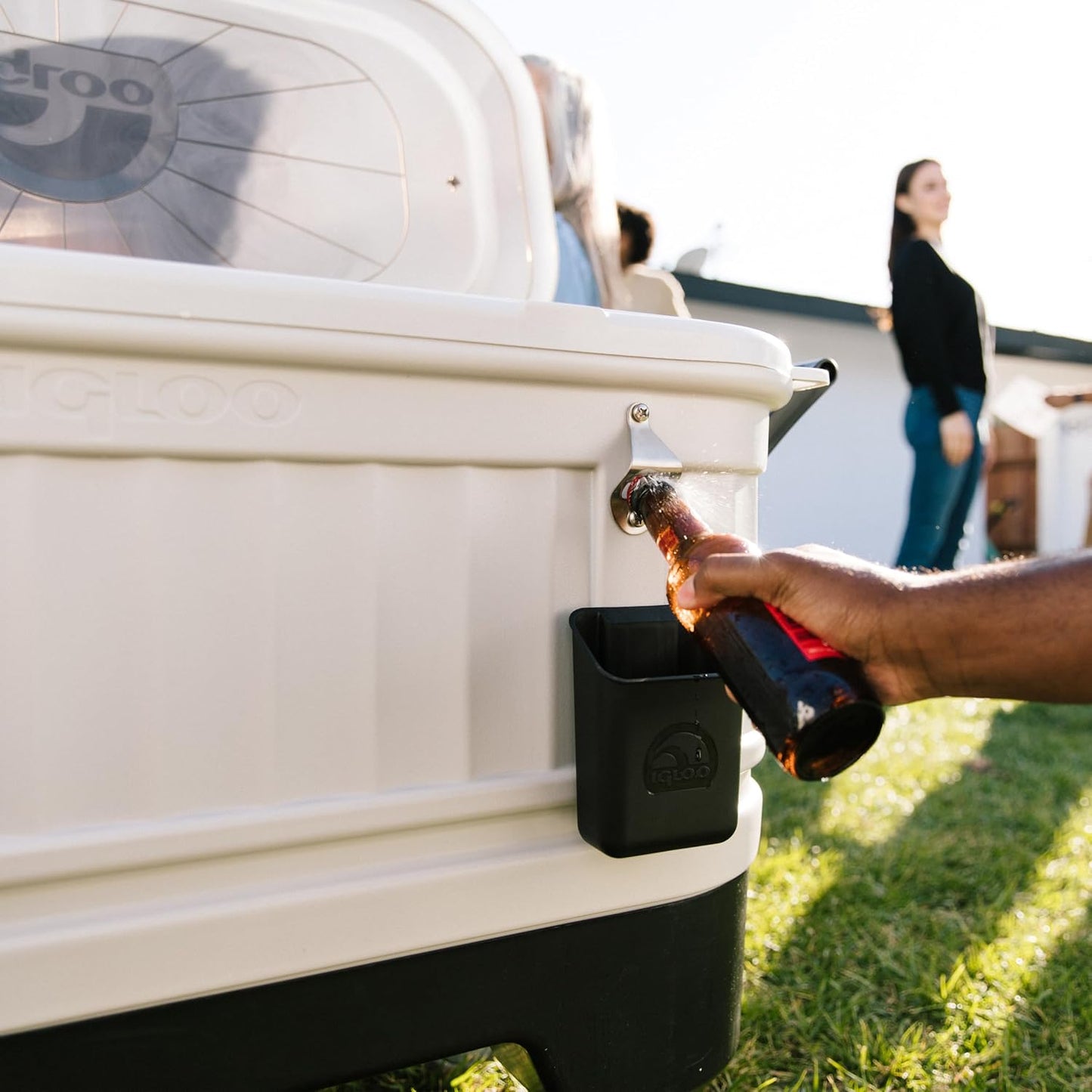 Igloo Party Bar 125 quart rolling hard cooler in gray with removable beverage tub lid, wheeled base, and stainless steel bottle opener for outdoor entertaining