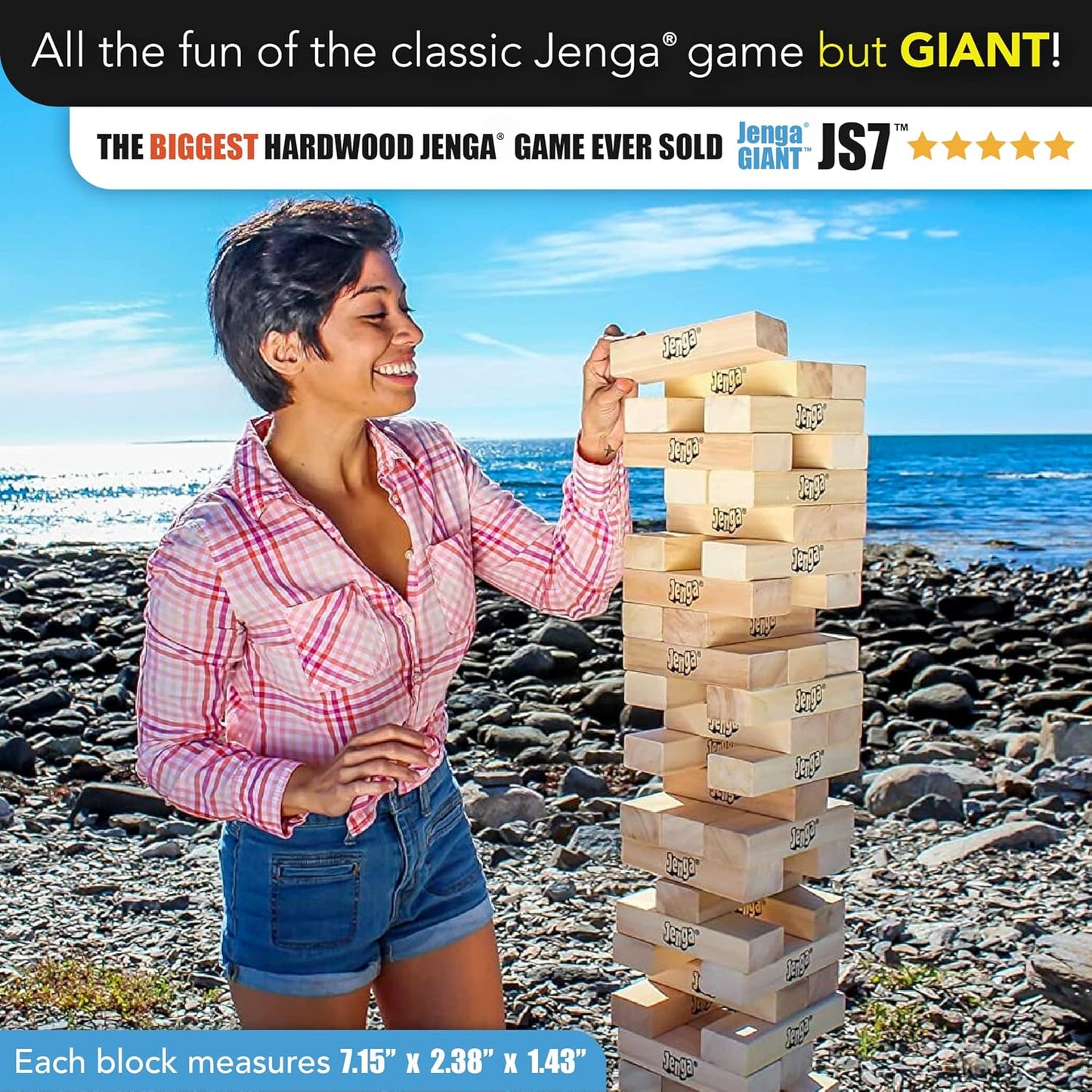 Jenga GIANT hardwood stacking game tower over 5 feet tall with 54 wood blocks set up outdoors at a backyard party