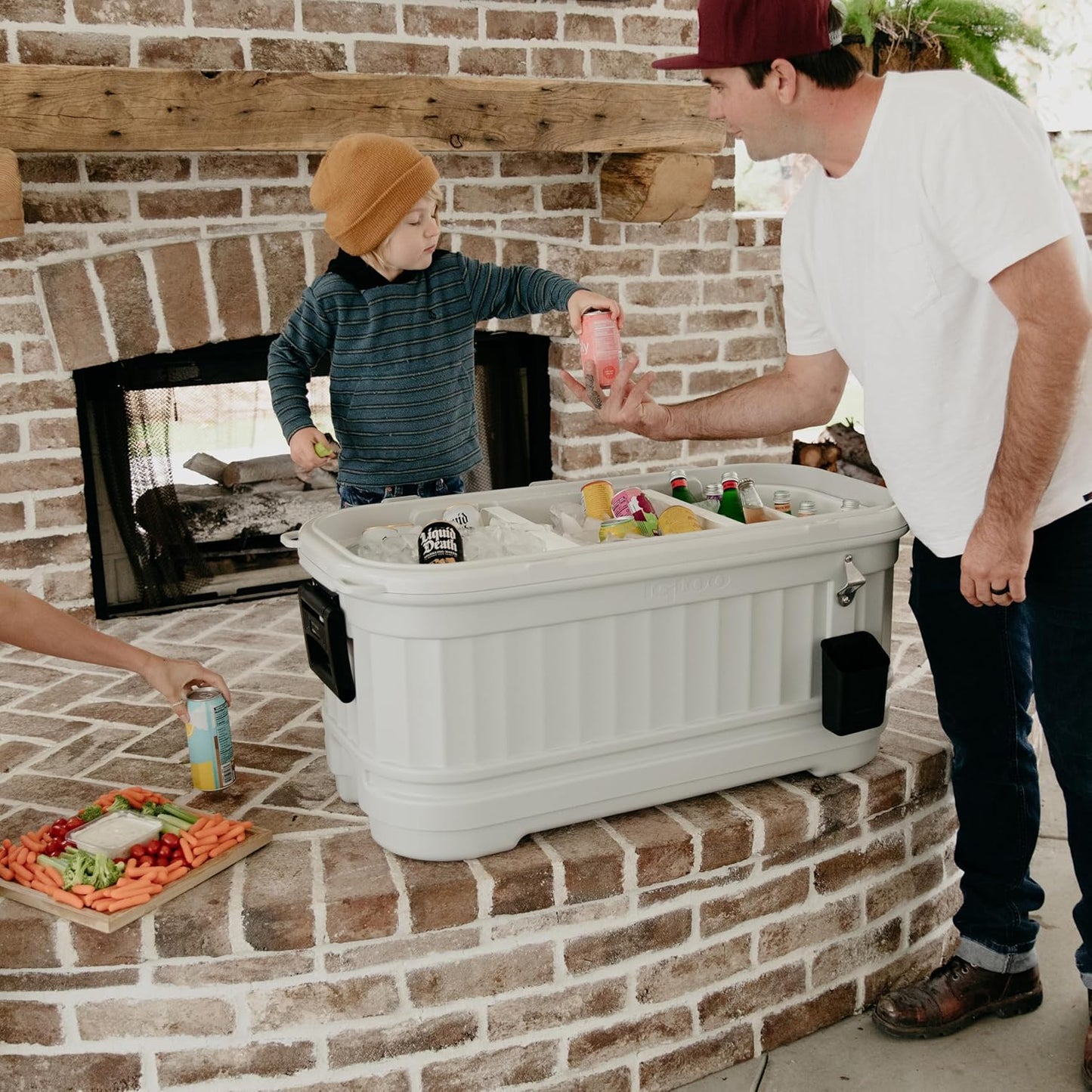 Igloo Party Bar 125 quart rolling hard cooler in gray with removable beverage tub lid, wheeled base, and stainless steel bottle opener for outdoor entertaining