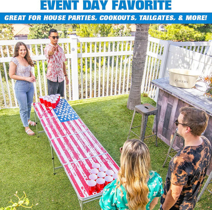 GoPong 8 foot portable beer pong and tailgate table in American Flag edition set up outdoors at a 4th of July backyard party