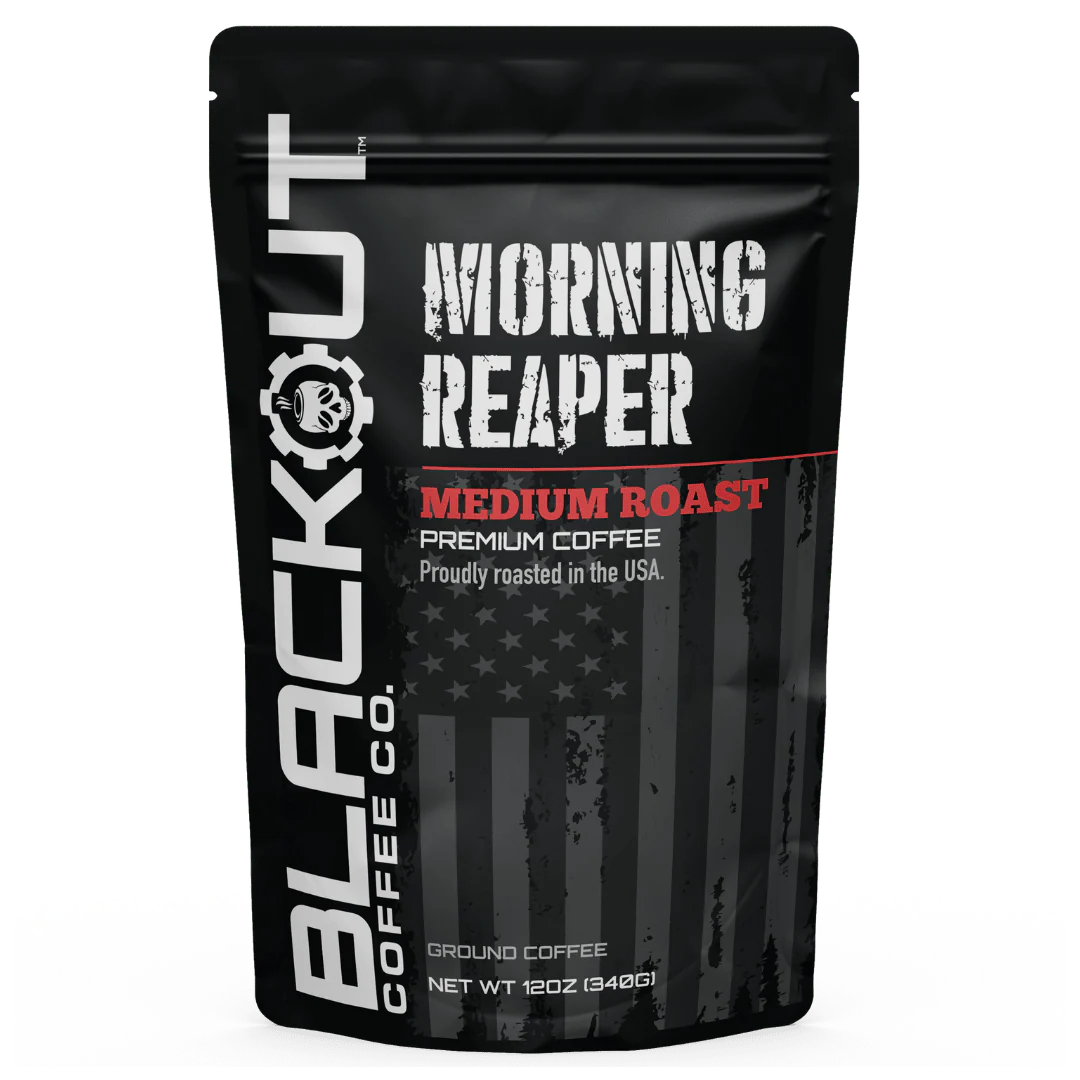 Blackout Coffee Morning Reaper 12oz coffee bag on a rugged dark surface with bold patriotic branding