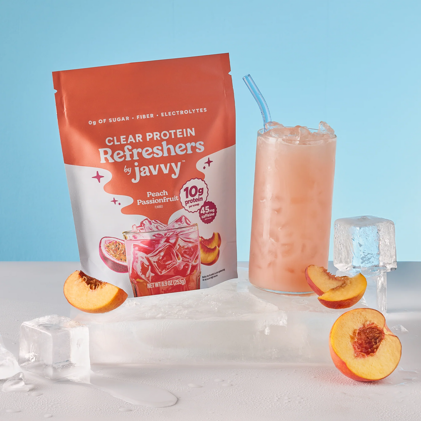 Javvy Protein Refreshers Clear Protein Drink Mix in Peach Passionfruit flavor — 10g protein, collagen, electrolytes, and prebiotics per scoop, no artificial sweeteners